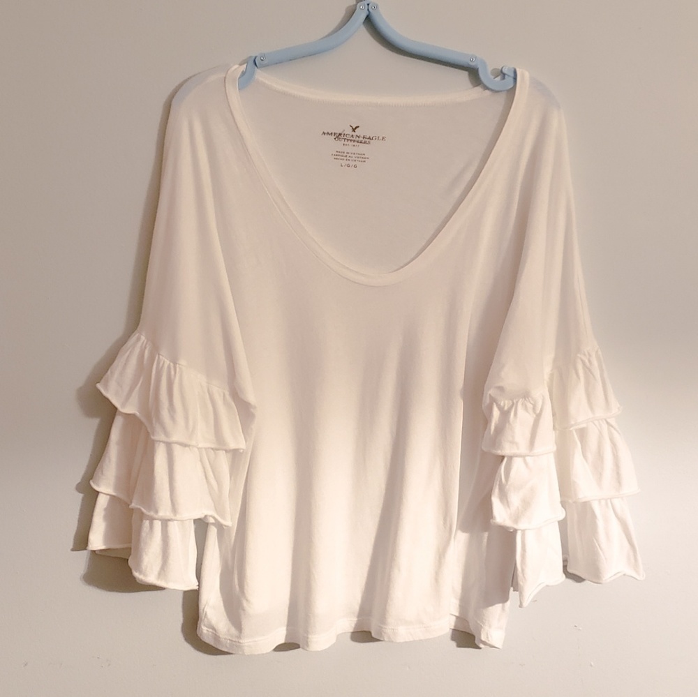 White bell sleeve blouse